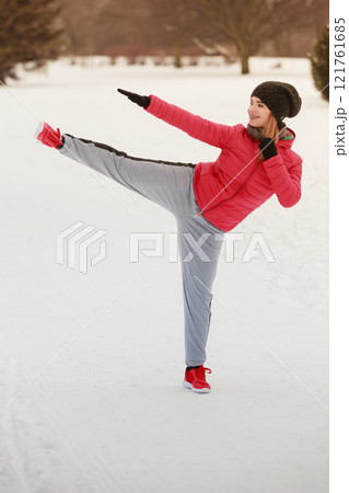 Woman wearing sportswear training boxing outside Woman wearing sportswear training boxing outside 121761685