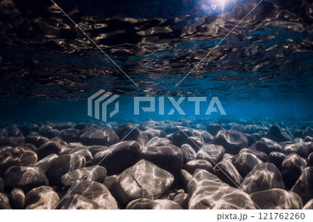 Tranquil underwater scene with copy space. Crystal clear blue sea 121762260