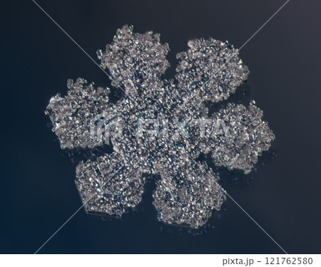 Natural snowflake crystal close-up macro photo 121762580