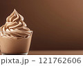 Side view of mocha or chocolate mousse dessert with smooth rich texture, soft brown background. Color trend concept, color of the year 2025. Banner with copy space. 121762606