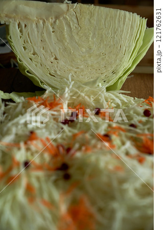 Process of harvesting sauerkraut. Autumn pickling of cabbage. ,cutting cabbage preparation 121762631