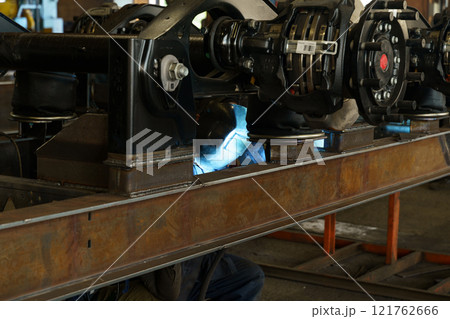 Welding operation on railway components in a busy manufacturing facility Welding operation on railway components in a busy manufacturing facility 121762666