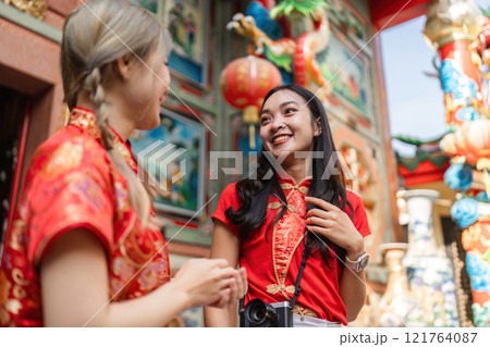 Celebrating chinese new year worship at a shrine cultural gathering urban environment close-up view community spirit 121764087
