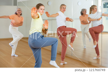 Group of women dancing modern dance Group of women dancing modern dance 121768749