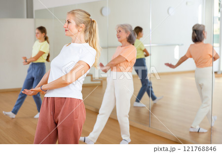 Woman dancing during group class 121768846