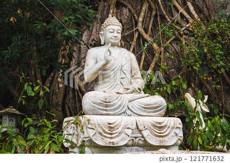Buddha sculpture in the garden at the pagoda in the marble mountains of Da Nang. Buddha sculpture in the garden at the pagoda in the marble mountains of Da Nang. 121771632