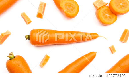 Fresh orange carrots and carrot slices on white background, healthy vegetables, vibrant color, organic food, isolated, raw, nutritious, diet, close-up, fresh produce, no preservatives Fresh orange carrots and carrot slices on white background, healthy vegetables, vibrant color, organic food, isolated, raw, nutritious, diet, close-up, fresh produce, no preservatives 121772302