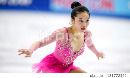 Asian female figure skater gliding on ice, performing graceful routine, focused expression, elegance in motion, professional athlete at winter competition, poised and artistic, ice rink Asian female figure skater gliding on ice, performing graceful routine, focused expression, elegance in motion, professional athlete at winter competition, poised and artistic, ice rink 121772322