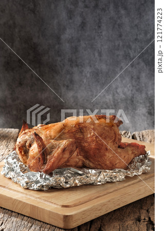 Freshly Baked Roasted Chicken with aluminum foil 121774223