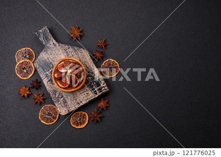 Sweet tart with figs, cheese cream and pecans 121776025