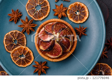Sweet tart with figs, cheese cream and pecans 121776046
