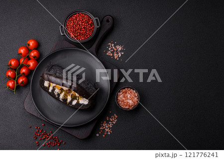 Sandwich with brioche bun, roast beef and vitello tonato sauce 121776241