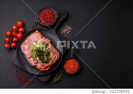 Focaccia with salami, cheese, tomatoes, arugula, salt, spices and herbs 121776341