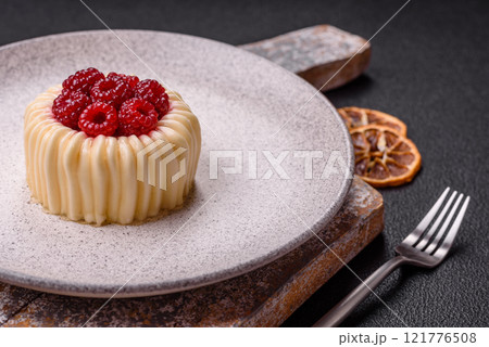 Sweet mousse tart with raspberries and filling Sweet mousse tart with raspberries and filling 121776508