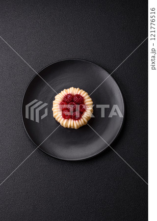 Sweet mousse tart with raspberries and filling Sweet mousse tart with raspberries and filling 121776516