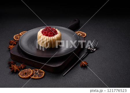 Sweet mousse tart with raspberries and filling 121776523