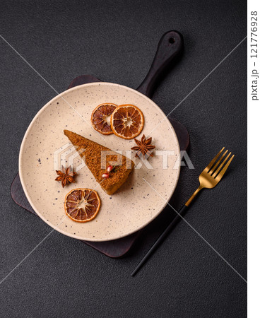 Piece of sweet layered honey cake Piece of sweet layered honey cake 121776928