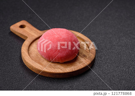 Delicious colorful asian mochi sweets with rice dough shell and fruit filling Delicious colorful asian mochi sweets with rice dough shell and fruit filling 121778868