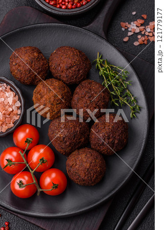 Falafel vegetarian and vegan dish made with chickpeas, spices and herbs 121779177