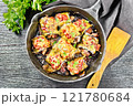 Rolls of eggplant with meat in pan on board top 121780684