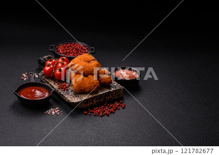 Delicious fresh crispy chicken nuggets, unhealthy food, fast food Delicious fresh crispy chicken nuggets, unhealthy food, fast food 121782677