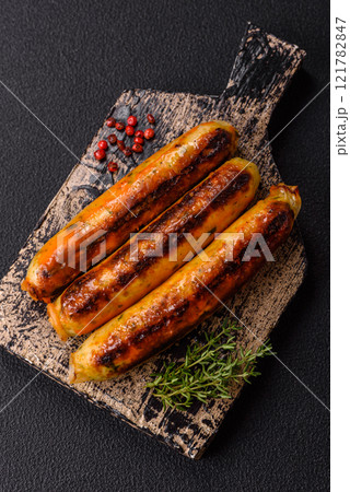 Chicken or pork sausages with salt, spices and herbs 121782847