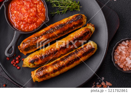Chicken or pork sausages with salt, spices and herbs Chicken or pork sausages with salt, spices and herbs 121782861