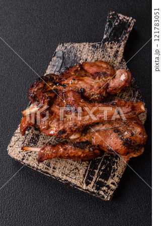Ribs or rack of beef baked on the grill with salt, spices and herbs 121783051