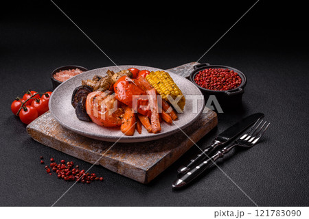 Grilled vegetables peppers, tomatoes, zucchini, onions, carrots, corn, mushrooms Grilled vegetables peppers, tomatoes, zucchini, onions, carrots, corn, mushrooms 121783090