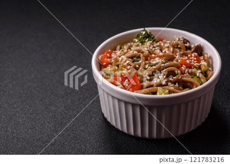 Buckwheat noodles with vegetables, salt and spices Buckwheat noodles with vegetables, salt and spices 121783216