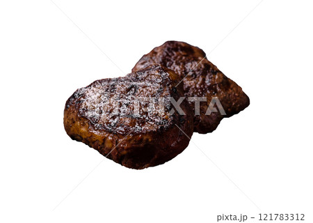 Juicy beef steak baked on the grill with salt, spices and herbs Juicy beef steak baked on the grill with salt, spices and herbs 121783312