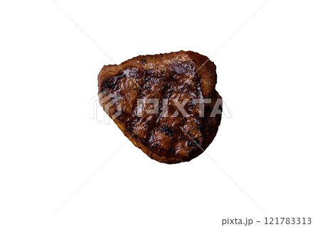 Juicy beef steak baked on the grill with salt, spices and herbs Juicy beef steak baked on the grill with salt, spices and herbs 121783313