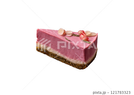 Piece of sweet cheesecake with pink cream cheese of raspberry or strawberry flavor 121783323