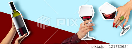 Hands holding cut-out wine bottle and clinking two glasses filled with red wine on blue and deep red background. Cheers 121783624
