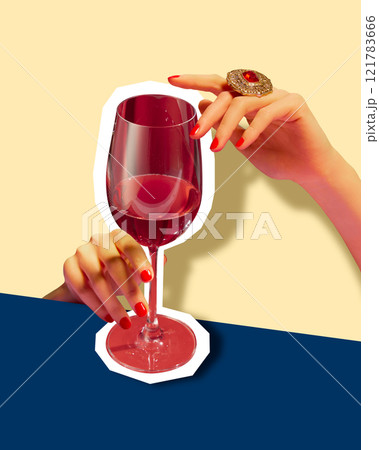 Creative collage. Female hand with red nails holding cut-out red wine glass with retro yellow and blue background. 121783666