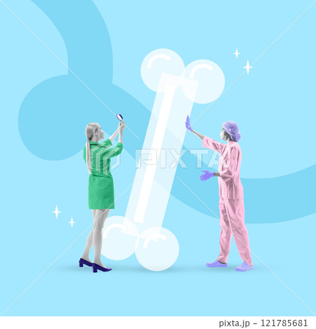 Two female doctors analyzing oversized glowing bone illustration against light blue background. Conceptual design. 121785681