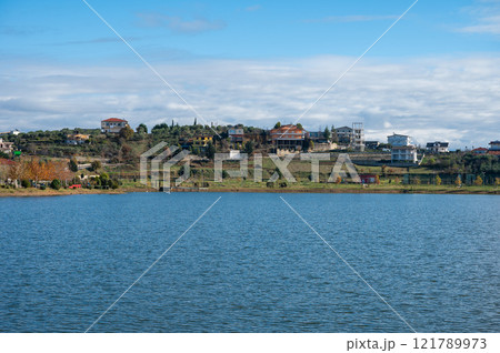 Recreation zone at the touristical Belshi Lake, Albania 121789973