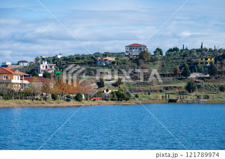 Recreation zone at the touristical Belshi Lake, Albania 121789974