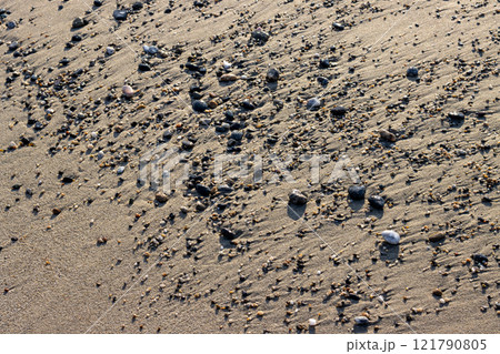 Structure of a gravel on the sand, Sicily, Italy 121790805