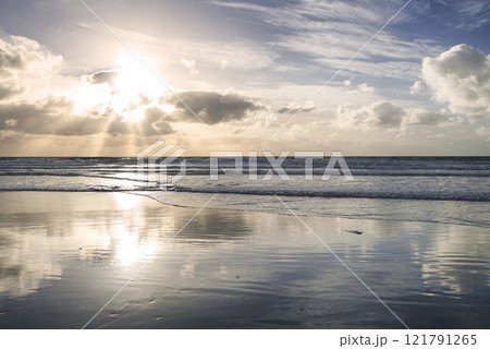 Copyspace at sea with cloudy twilight sky background above the horizon at sunset. Calm ocean waters at a beach in Torrey Pines, San Diego, California. Majestic scenic landscape for relaxing getaways Copyspace at sea with cloudy twilight sky background above the horizon at sunset. Calm ocean waters at a beach in Torrey Pines, San Diego, California. Majestic scenic landscape for relaxing getaways 121791265