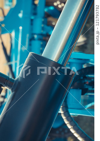 Black pistons or actuators as part of pneumatic or hydraulic machine. Technology 121793782