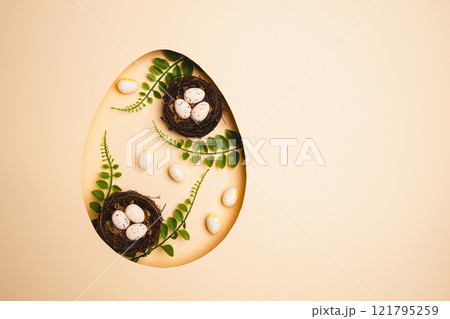 Top view pastel beige background with Easter decor 121795259