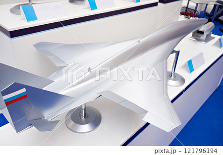 Model of military fighter plane at exhibition 121796194