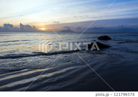 Beau Vallon beach night landscape at night, blue shore water Beau Vallon beach night landscape at night, blue shore water 121796578