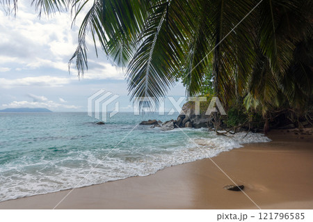 Sunset Beach on a cloudy day, Mahe island, Seychelles Sunset Beach on a cloudy day, Mahe island, Seychelles 121796585