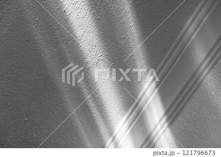 Abstract minimal white interior fragment with pattern of bright light 121796673