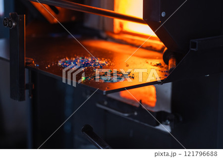 An open furnace at glass-blowing studio An open furnace at glass-blowing studio 121796688