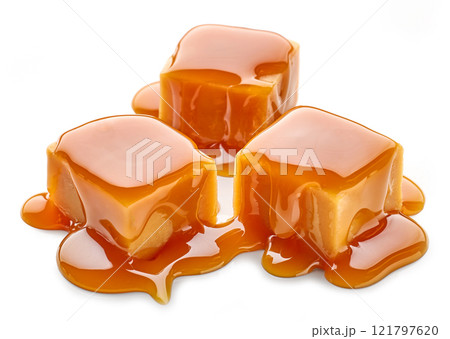 caramel candies in melted caramel sauce caramel candies in melted caramel sauce 121797620