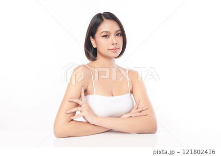 Beautiful young asian woman with clean fresh skin on white background, Face care, Facial treatment, Cosmetology, beauty and spa, Asian women portrait. Beautiful young asian woman with clean fresh skin on white background, Face care, Facial treatment, Cosmetology, beauty and spa, Asian women portrait. 121802416