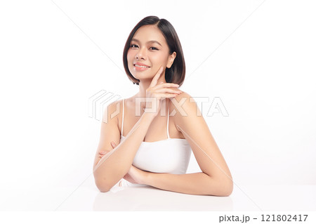 Beautiful young asian woman with clean fresh skin on white background, Face care, Facial treatment, Cosmetology, beauty and spa, Asian women portrait. Beautiful young asian woman with clean fresh skin on white background, Face care, Facial treatment, Cosmetology, beauty and spa, Asian women portrait. 121802417